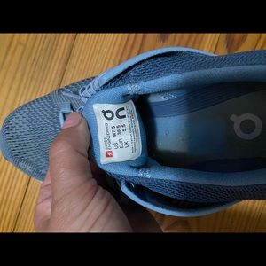 On cloud blue tennis shoes